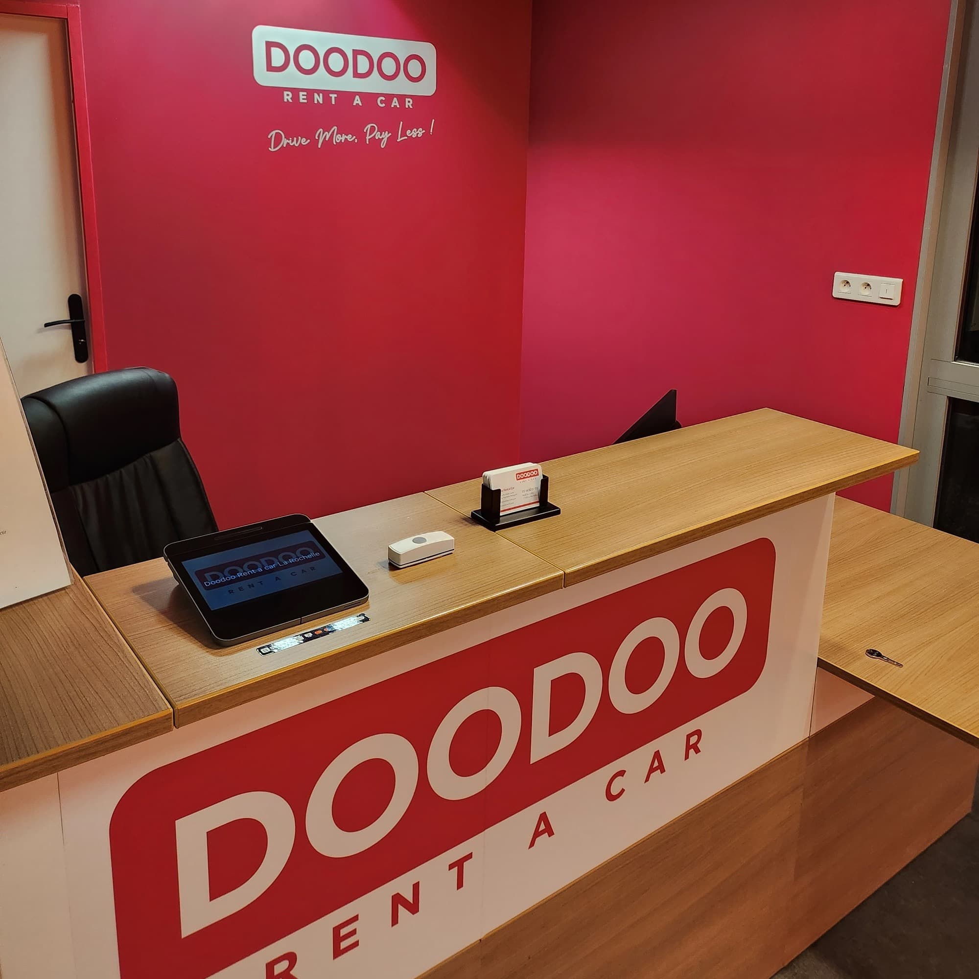 Branded DOODOO agency desk and counter